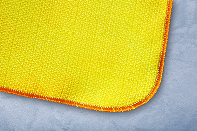 Вариант обметки сервировочных салфеток оверлоком с закруглёнными углами